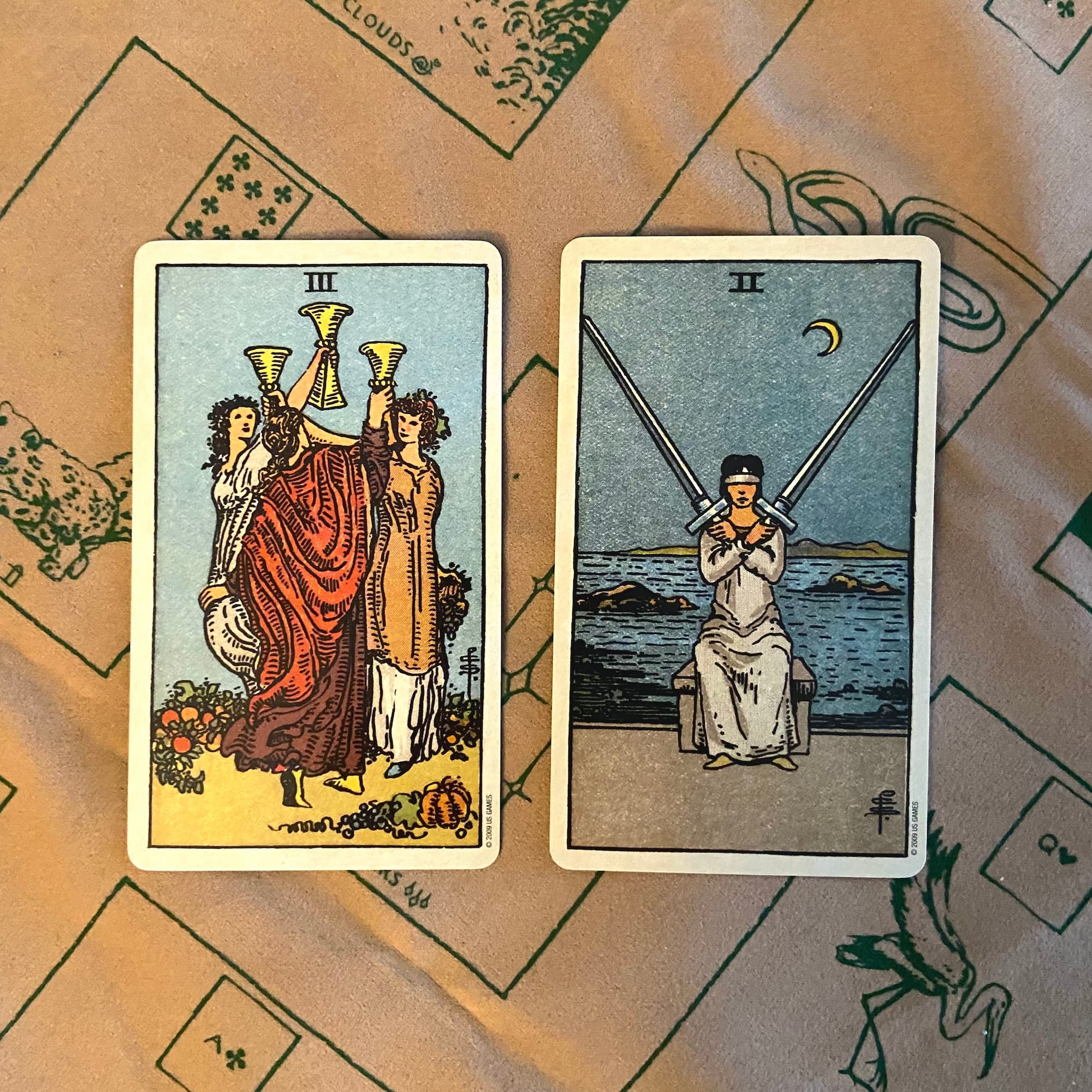 centennial_2cups_2swords.jpgtwo-card tarot spread showing the 3 of cups and 2 of swords
